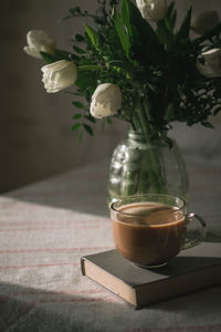 Close-up of coffee cup on table