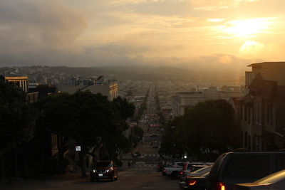 Cityscape against sky during sunset