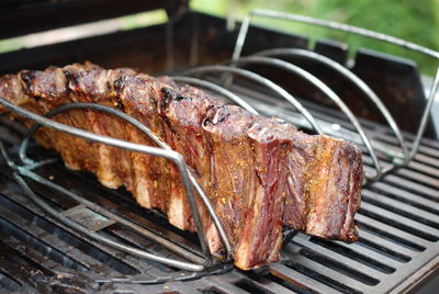 Close-up of meat on barbecue grill