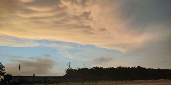 Scenic view of dramatic sky over landscape