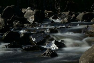 Stream flowing through rocks