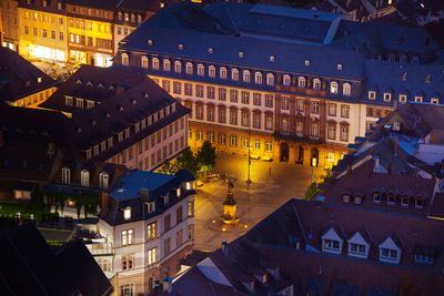 High angle view of buildings at night