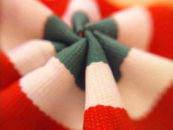 Close-up of red object on table