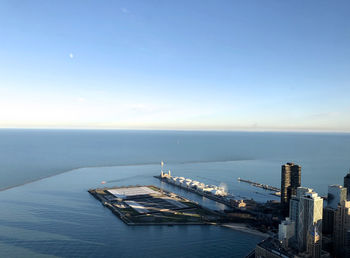Scenic view of sea against blue sky