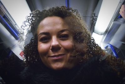 Portrait of beautiful woman in car