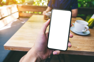 Close-up of woman using mobile phone