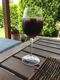 Close-up of wineglass on table