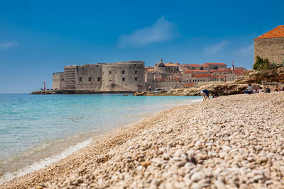 The beautiful banje beach and dubrovnik city