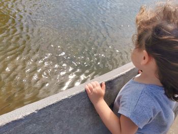 Portrait of girl with sea in background