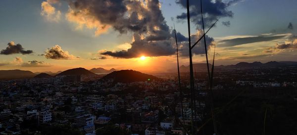 High angle view of townscape against sky during sunset