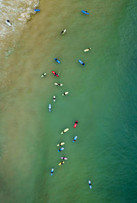 High angle view of people on sea