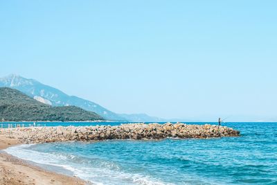 Scenic view of sea against clear sky