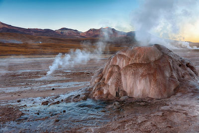 Smoke emitting from volcanic mountain