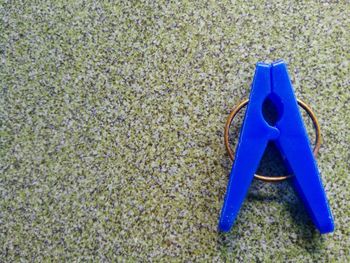 High angle view of blue toy on sand