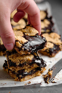 Close-up of hand holding dessert