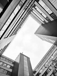 Low angle view of modern buildings against sky