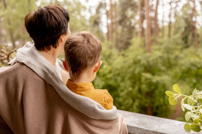 Happy grandmother and grandson enjoy time together. positive middle age woman