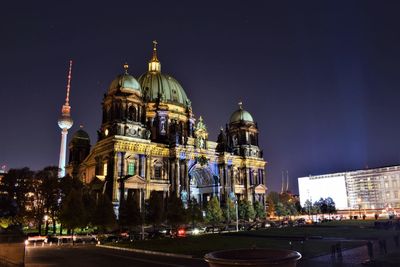 Low angle view of berlin cathedral against sky at night