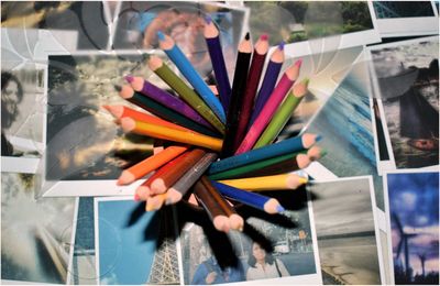 Close-up of multi colored pencils on table