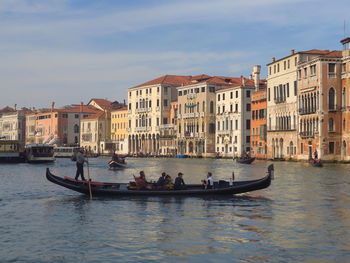 People gondola in venice canal