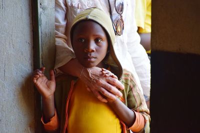 Portrait of teenage girl looking at camera