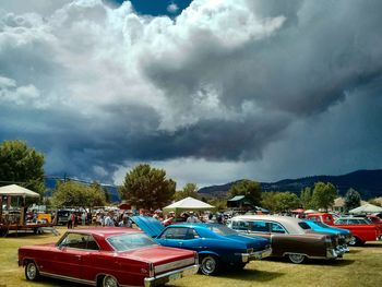 Parking lot against cloudy sky