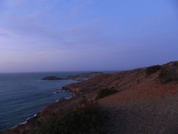 Scenic view of sea against blue sky