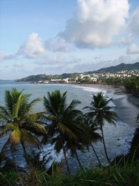 Scenic view of sea against cloudy sky