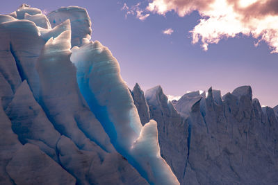 Scenic view of snowcapped landscape against sky