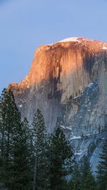 Low angle view of rock formation against clear sky