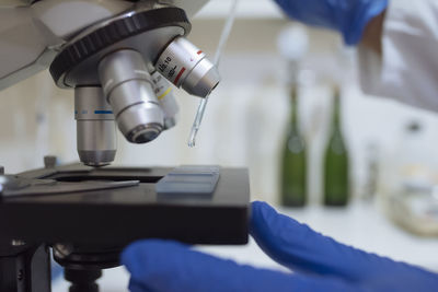 Close up of sample on microscope in winery laboratory.