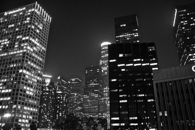 Low angle view of modern building at night