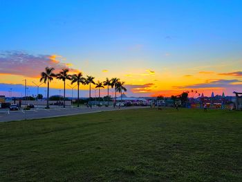 Scenic view of landscape against sky during sunset