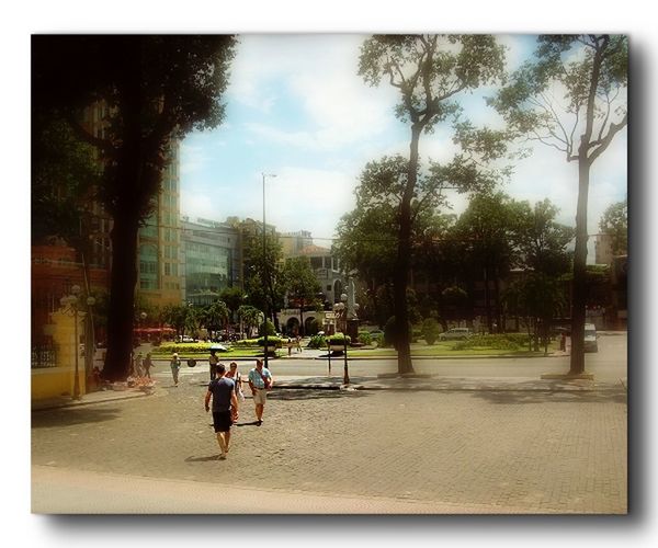 transfer print, men, tree, lifestyles, auto post production filter, leisure activity, full length, building exterior, walking, person, architecture, built structure, city, sky, rear view, street, city life, togetherness