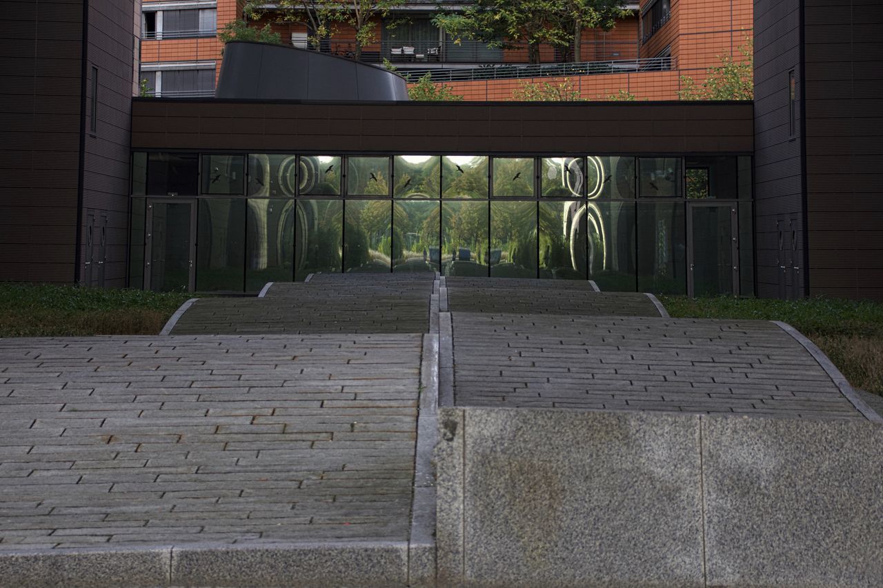 FOOTPATH AMIDST BUILDINGS