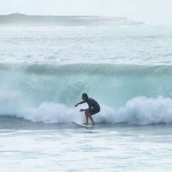 Man surfing in sea
