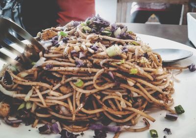 Close-up of noodles in plate on table