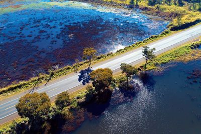 High angle view of cars on street in city