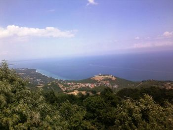 Scenic view of town against sky