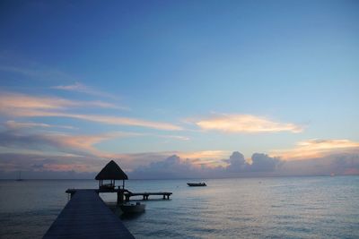 Scenic view of sea at sunset