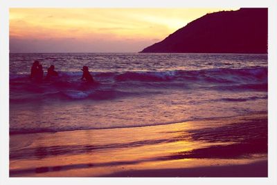 Scenic view of sea at sunset