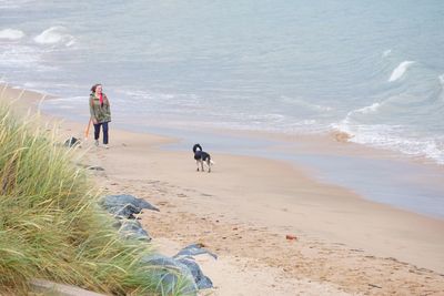 People walking on beach