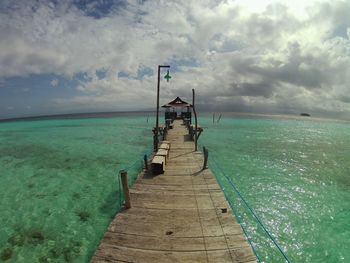 Scenic view of sea against storm clouds