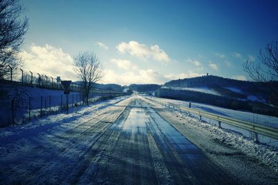 Road against sky during winter