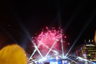 Firework display at night