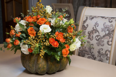 Close-up of flowers in vase on table