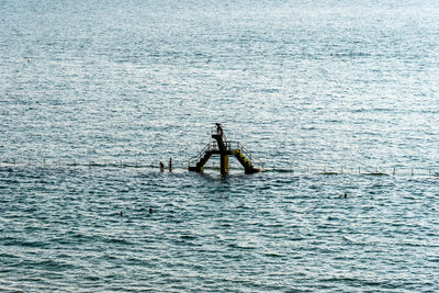 People on boat in sea