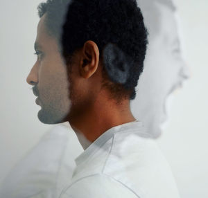 Close-up of young man looking away