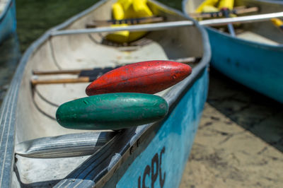 High angle view of oars in boat moored