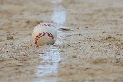 Close-up of ball on beach